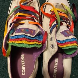 White converse with rainbow laces and tongues